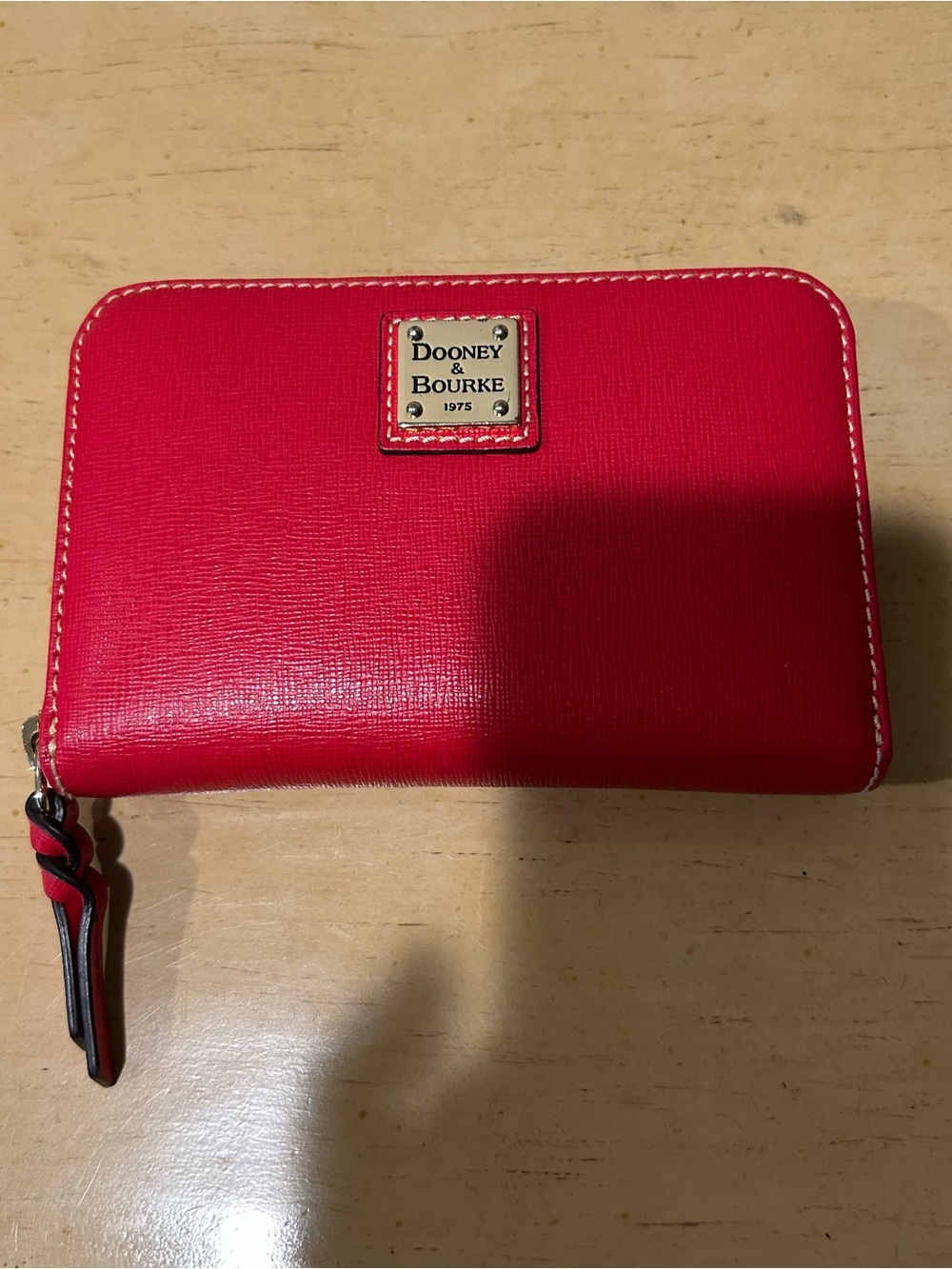 Dooney & Bourke 1975 Wexford  medium leather zip around red wallet